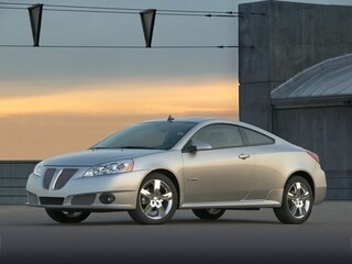 2010 Pontiac G6 Coupe. $28,960 MSRP. Hwy 26/City 17 MPG