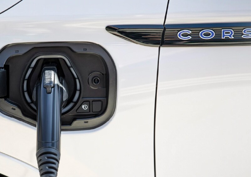 A charging chord is shown connected to a Lincoln Corsair Grand Touring