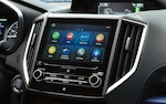 A close-up of the SUBARU STARLINK® Multimedia touchscreen in the 2021 Crosstrek Hybrid.