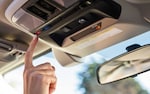 A close-up of the controls for the SUBARU STARLINK® Safety and Security system in the 2021 Crosstrek Hybrid.