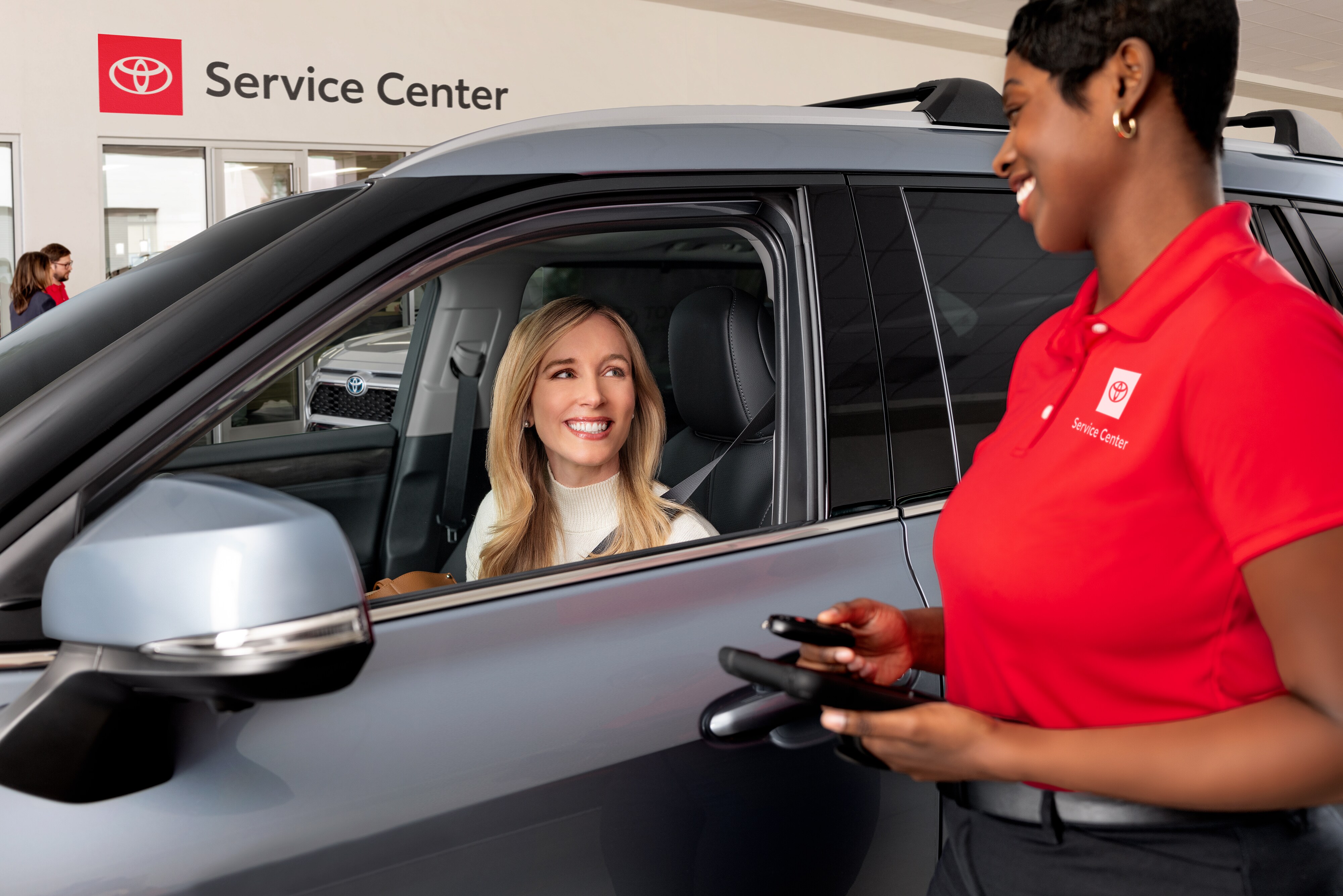 Service technician discussing service with customer.