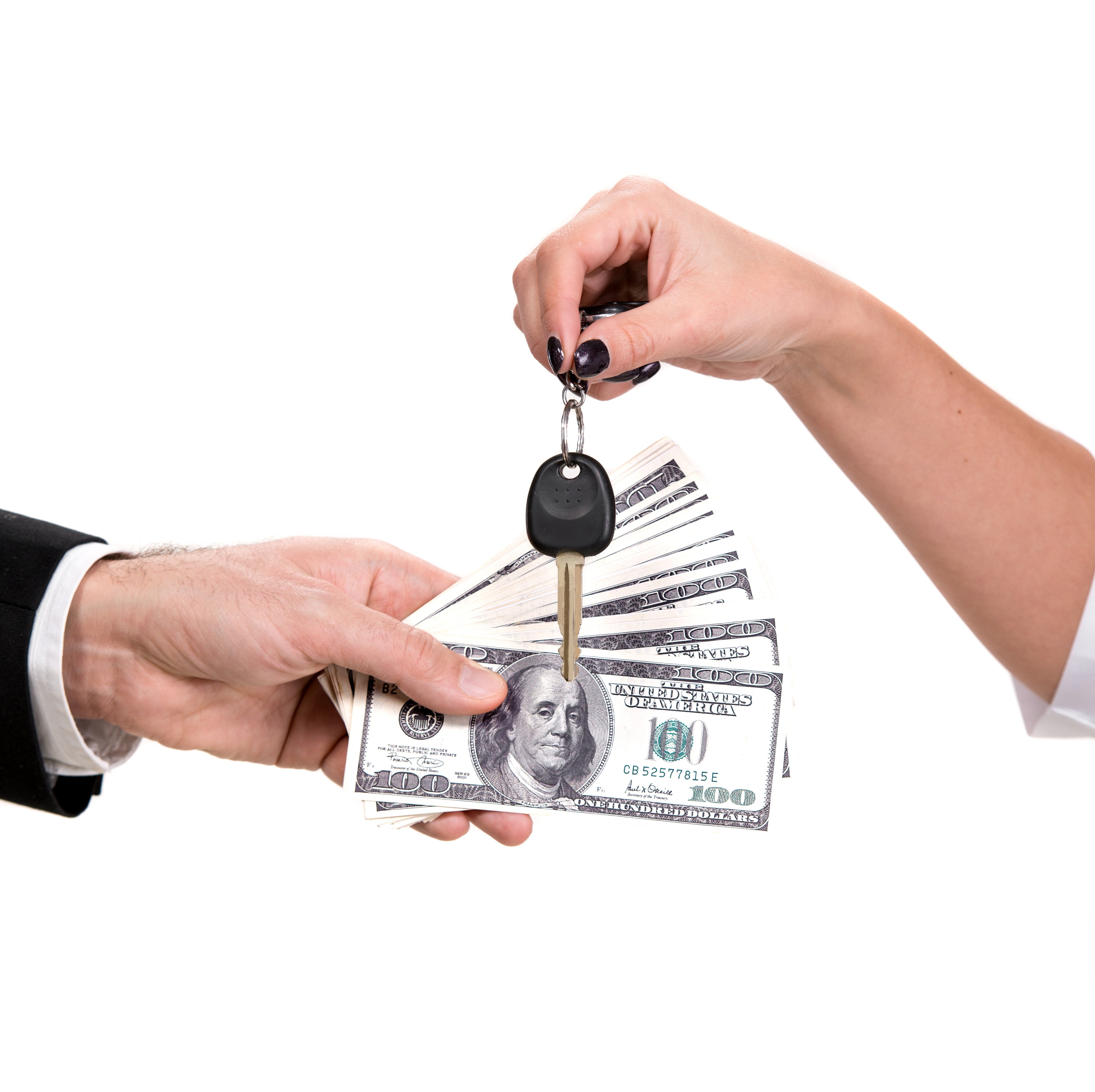 A set of car keys being traded for cash
