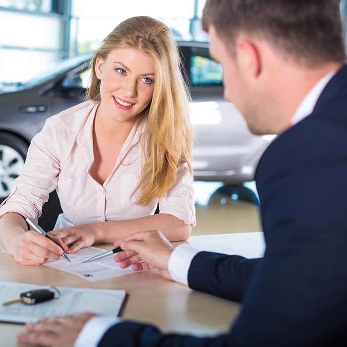 A Guest Reviewing Title Agreement with an Associate