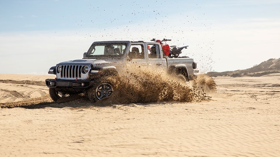 2021 Jeep Gladiator Driving Through Sand