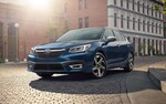 A 2021 Subaru Legacy on a city street.