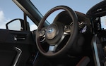 A close-up of the leather-wrapped steering wheel in the 2020 BRZ.