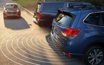 A photo illustration showing the Rear Cross-Traffic Alert sensors on the 2021 Subaru Forester.