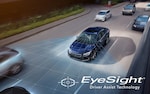 A 2021 Impreza sedan driving on a highway with blue graphics illustrating the EyeSight® sensors.