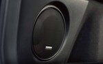 A close-up of one of the speakers in the Harman Kardon premium audio system available on the 2021 Subaru Outback.