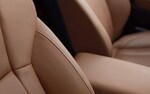 A close-up of the genuine Nappa leather-trimmed interior with contrast stitching inside the 2021 Outback Touring model.