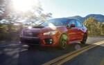 A 2021 WRX on a mountain road.