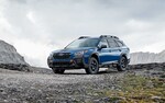 2022 Outback Wilderness in Geyser Blue parked on a rocky road.