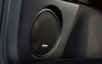 A close-up of one of the speakers in the Harman Kardon premium audio system available on the 2022 Subaru Outback. 